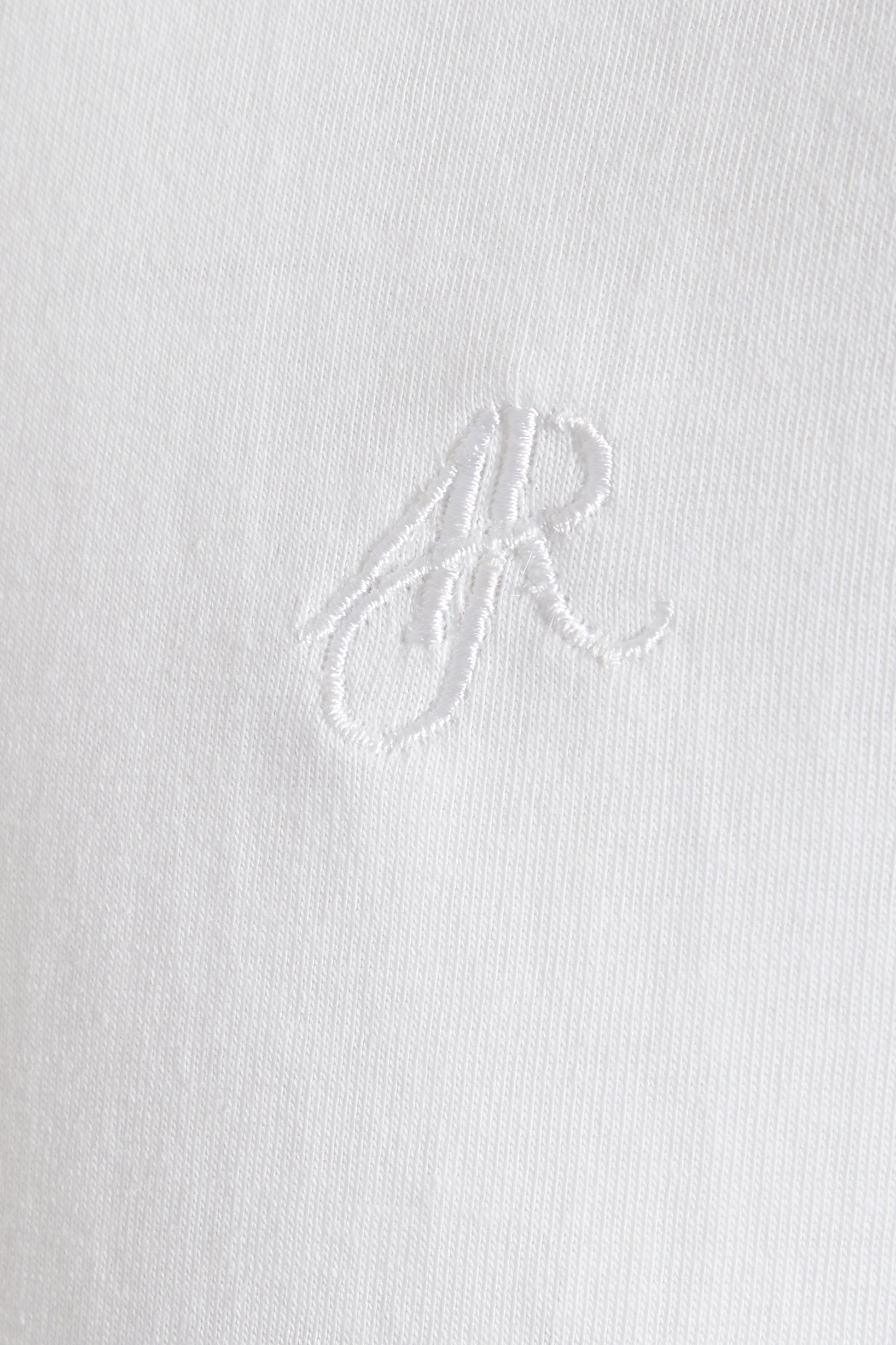 White jersey polo jacquard collar