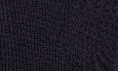 Navy pique polo with check buttoned down collar